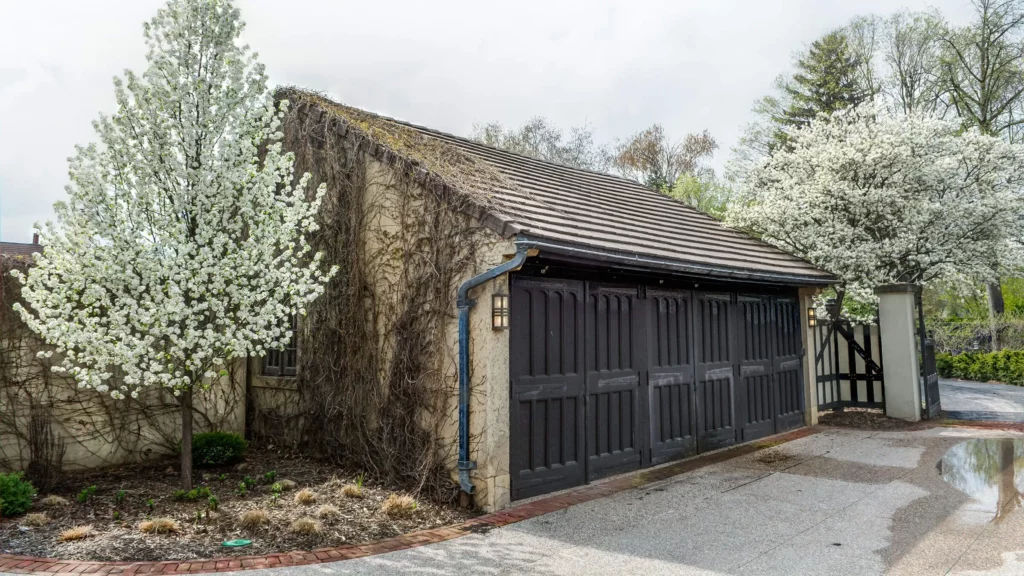 The Tudor-style Courtyard Garage in early spring.