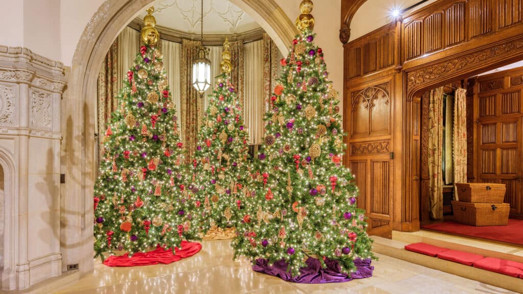 Three Christmas trees represent the Arabian dance in an alcove of the Great Hall.