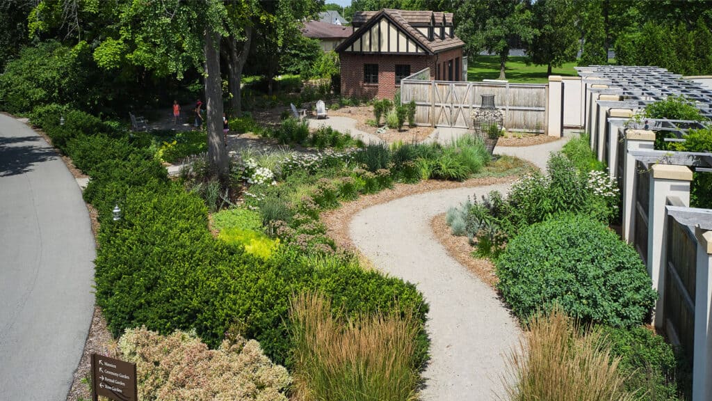 An aerial view of the Contemporary Garden in early August, featuring grasses, anemones, and perennials.