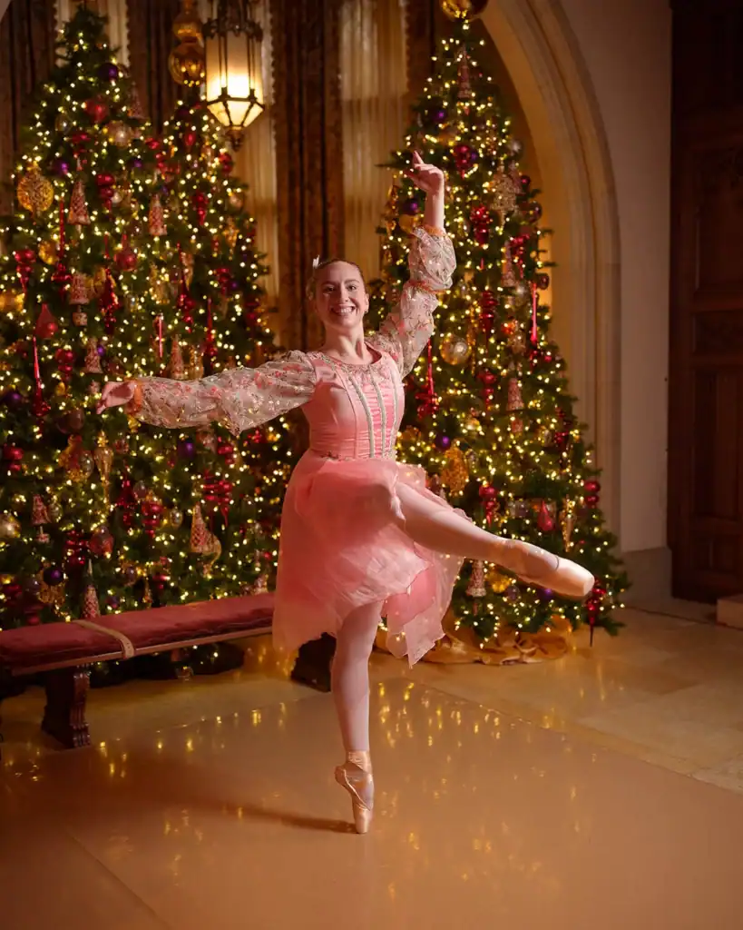 A dancer for Nutcracker in the Castle poses.