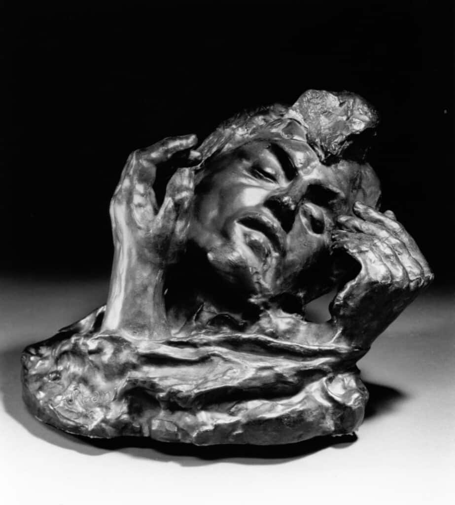 Auguste Rodin (French, 1840 – 1917) Head of Shade With Two Hands Modeled 1910; Musée Rodin cast 2 Bronze; Alexis Rudier Foundry 7 5/8 x 10 3/4 x 8 1/8 inches Lent by Iris Cantor