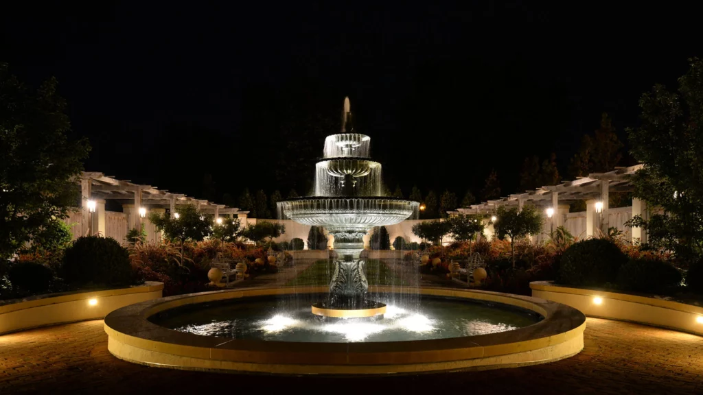 The Formal Garden is illuminated at night during Jazz in the Gardens.