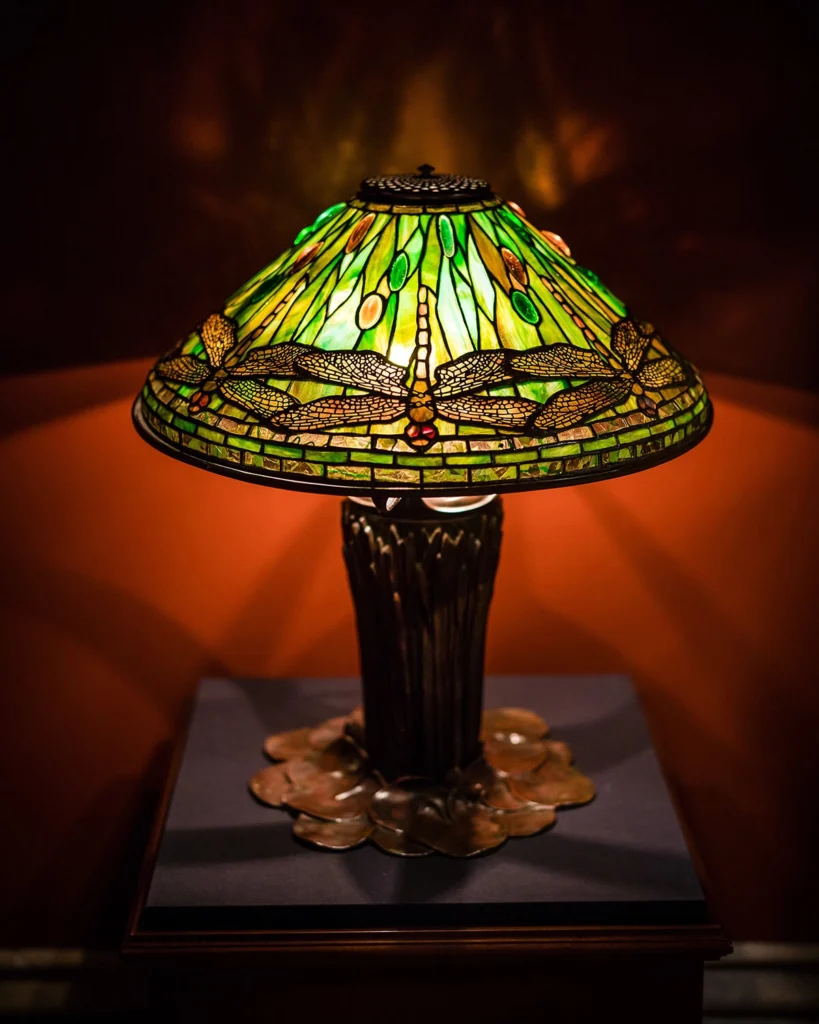 A stained glass lamp with dragonflies.