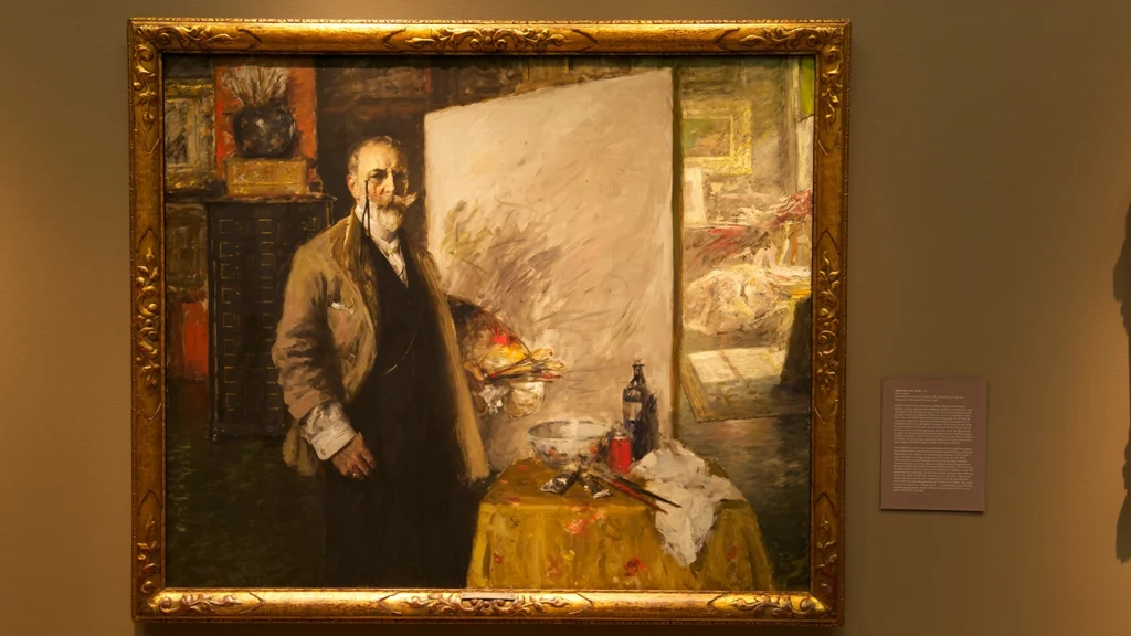 An artwork by William Merritt Chase hangs on a wall.