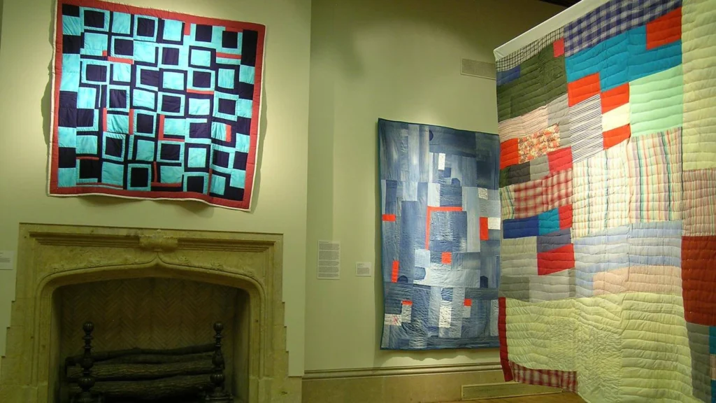 Brightly colored quilts on view in the main gallery.