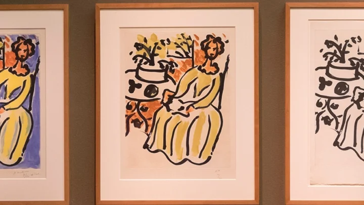 Artworks by Henri Matisse hang on a wall.