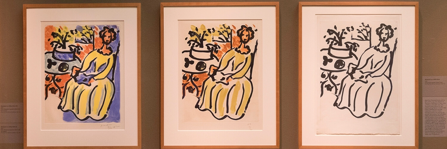 Artworks by Henri Matisse hang on a wall.