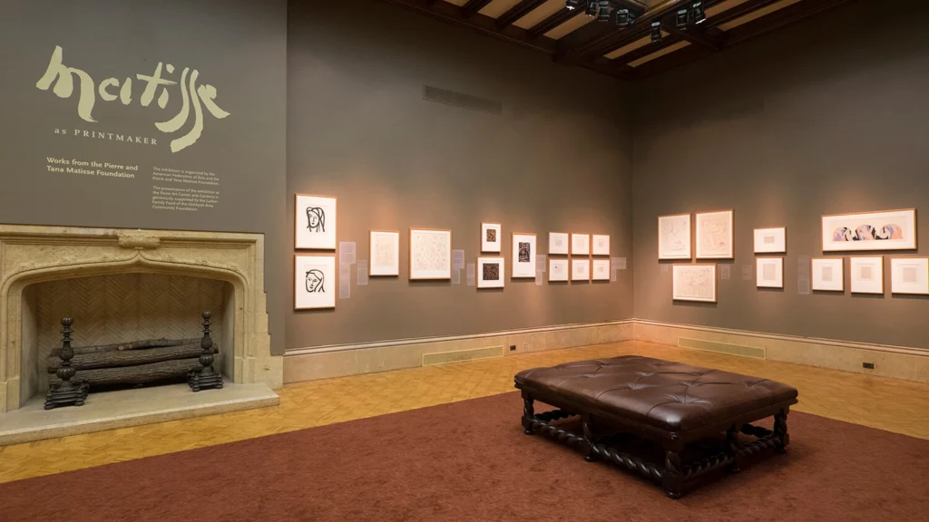 Artworks by Henri Matisse hang on a wall.