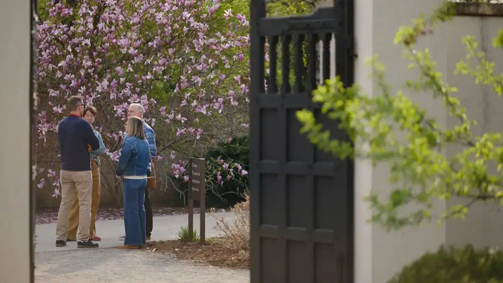 Paine Members gather in the gardens