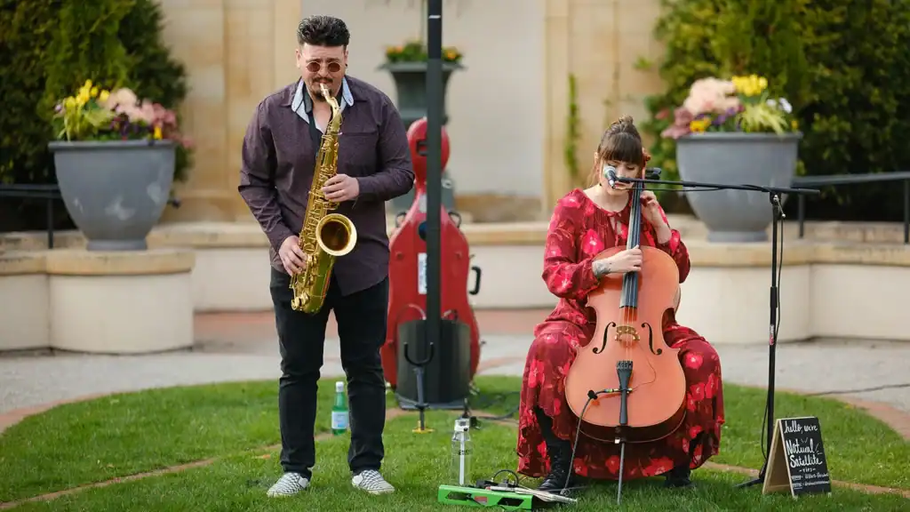 "Natural Satellite" performs in the gardens