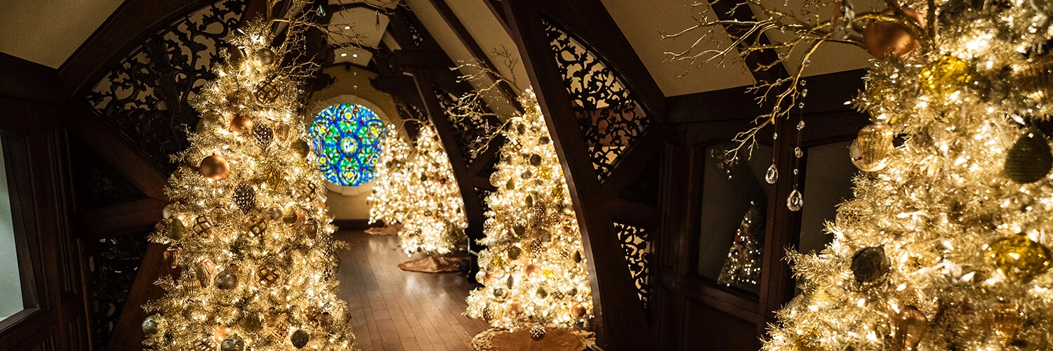 Golden Christmas trees on display in the Gothic Gallery