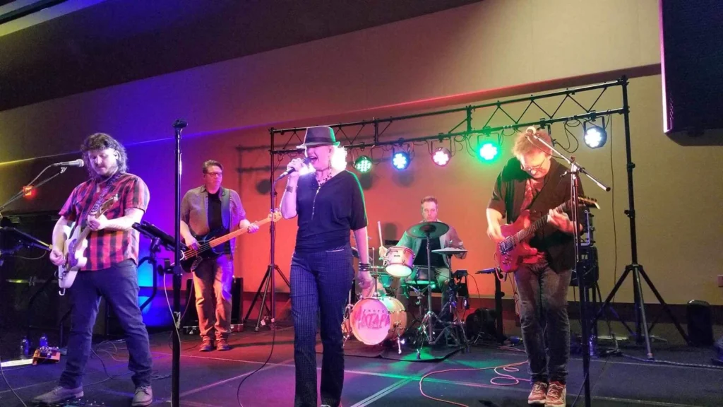 A band performs at night