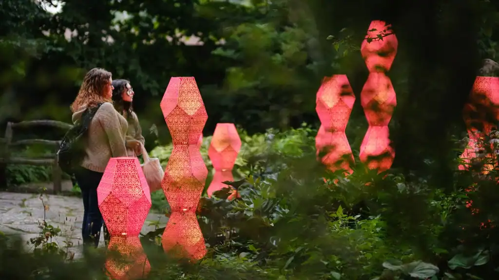 Sculptures at twilight during The Nature of Light