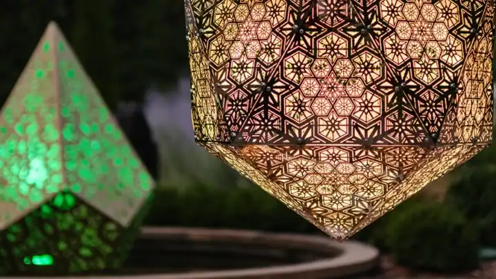 Sculptures at twilight during The Nature of Light