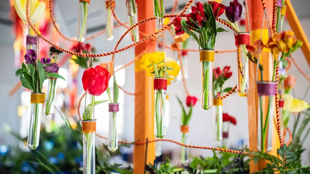 Florals hanging in bud vases
