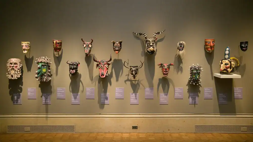 Mexican masks on view for "Dancing with Life: Mexican Masks" in the main gallery.