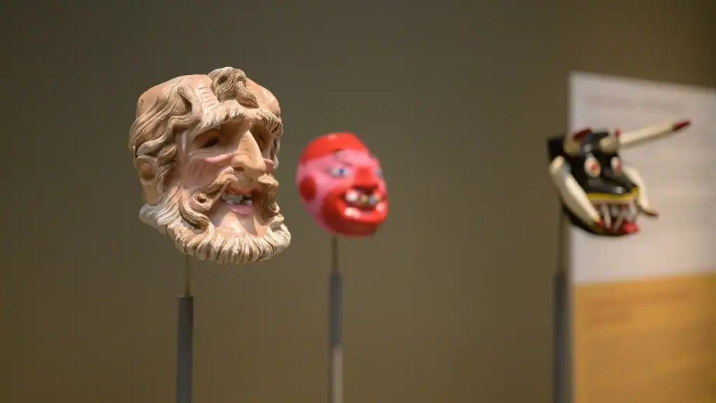 Close up of a Mexican mask on view for "Dancing with Life: Mexican Masks" in the main gallery.