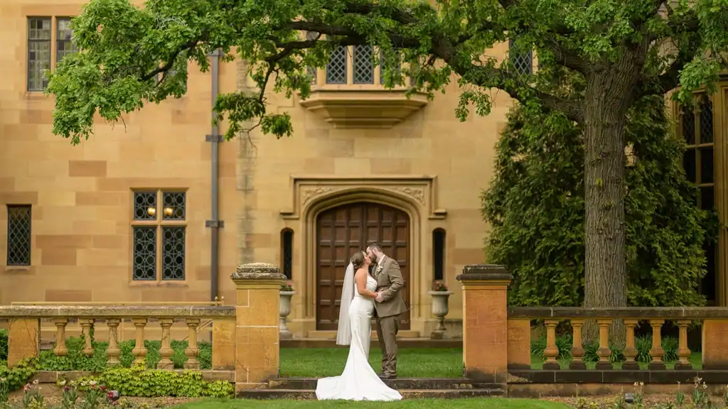 A couple poses on their wedding day
